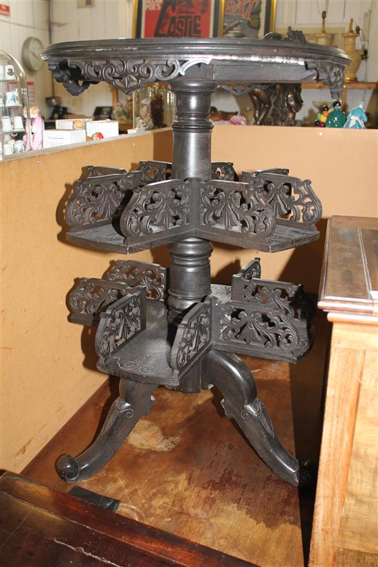 Oriental circular ebonised what-not